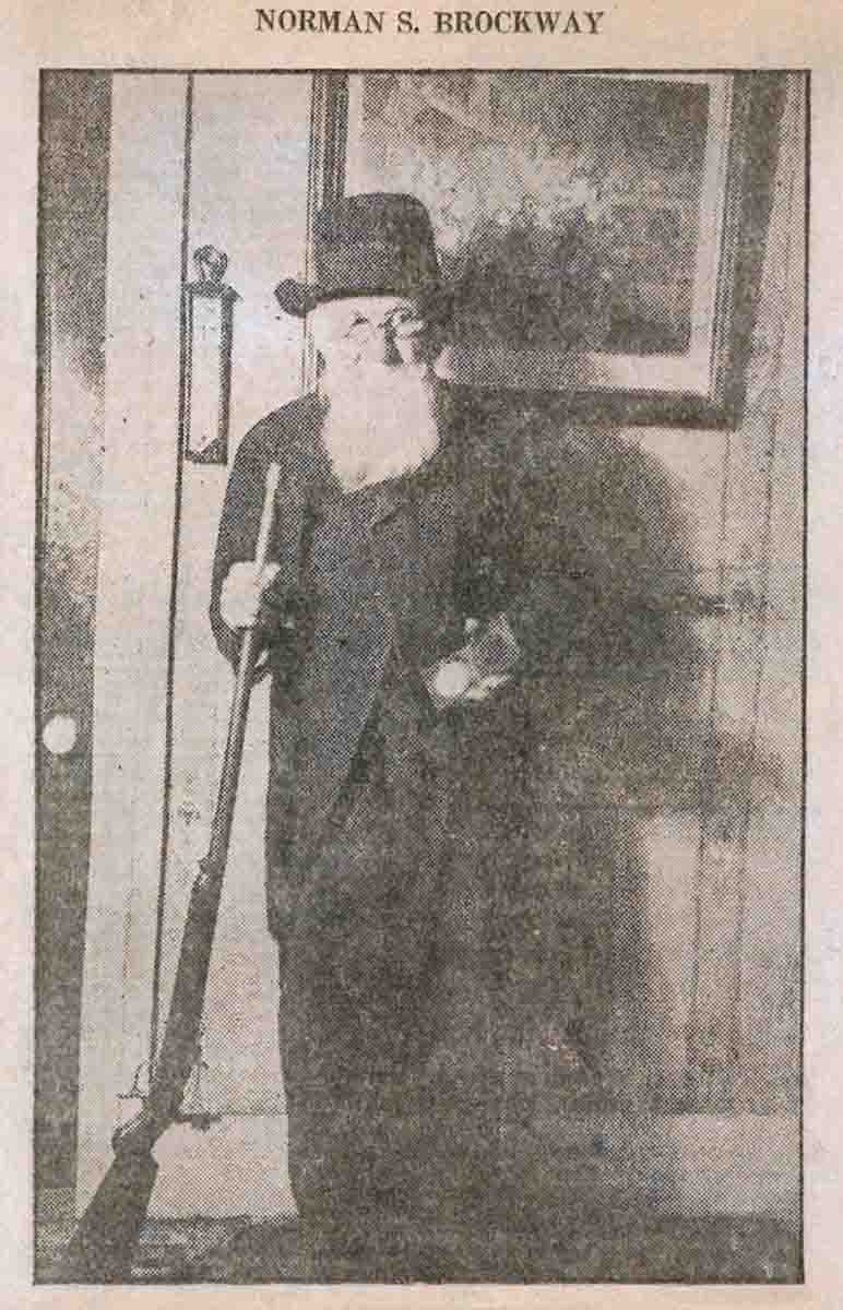 Norman S. Brockway with his personal offhand gun and the silver medal won for marksmanship when secretary of the National Rifle Club.